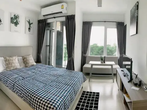 Beautiful room with glass on the wall, looks open, very comfortable, simple but perfectly decorated Chapter One Eco Ratchada-Huay Kwang