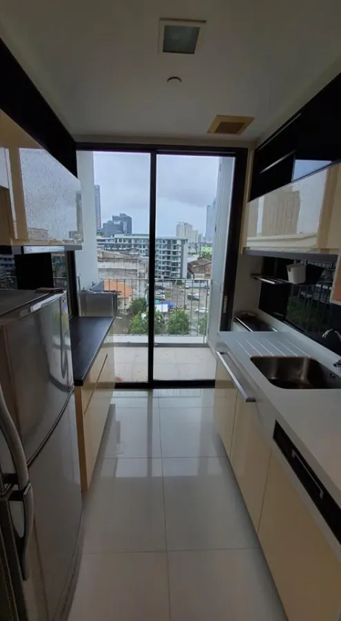 For rent: The Room Sukhumvit 62, bedrooms with awesome wallpaper. The view saw many shady trees. Let me tell you, you have to make a reservation.