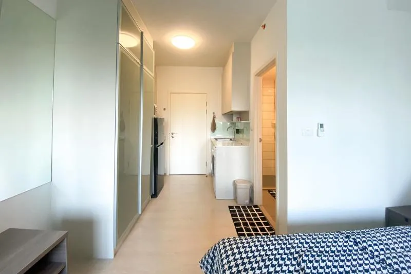 Beautiful room with glass on the wall, looks open, very comfortable, simple but perfectly decorated Chapter One Eco Ratchada-Huay Kwang