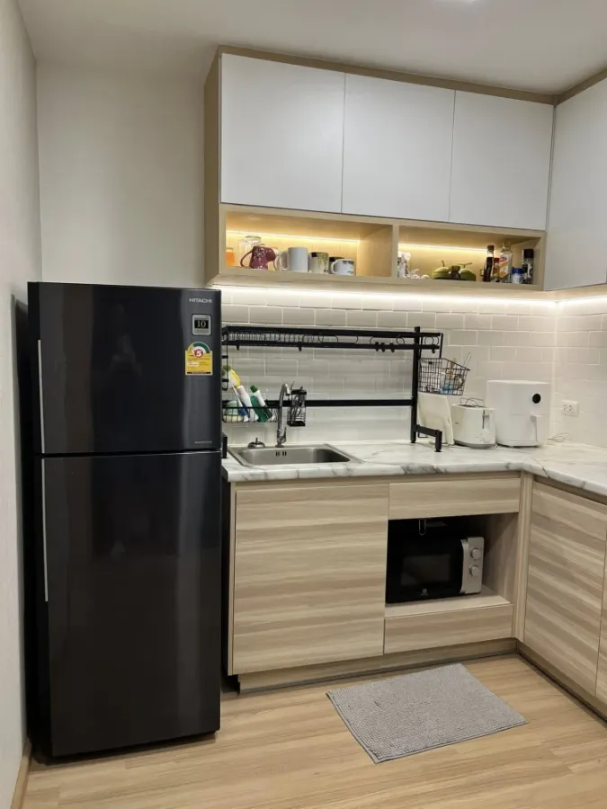 Plum Condo Mix Chaengwattana for sale. Very well maintained, **built-in furniture throughout**, beautiful condition, ready to move in immediately.