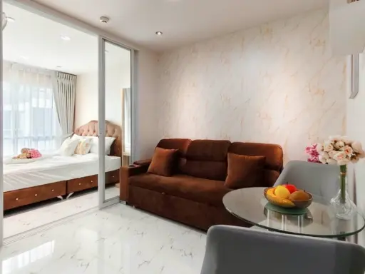 For rent: Regent Home Sukhumvit 81. Beautiful, clean tiled floor, pool and garden view. The room is exactly as pictured, a must-book!