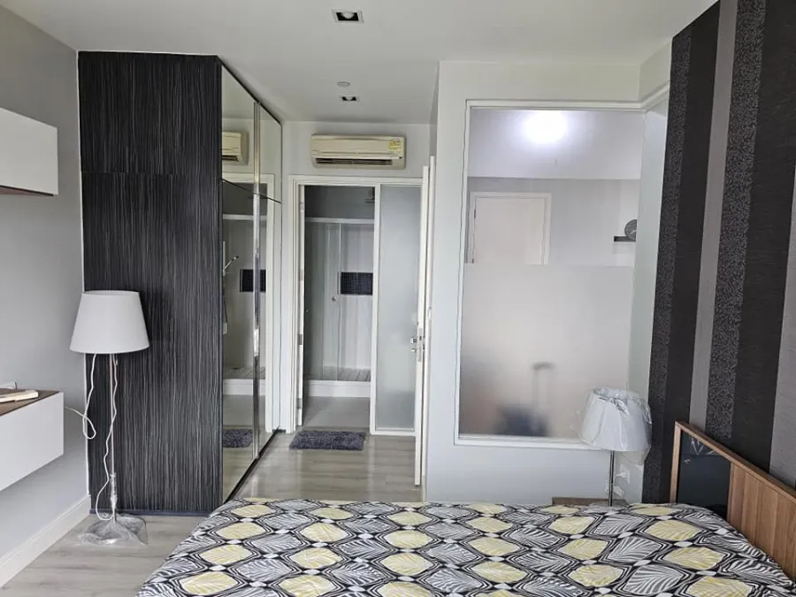 For rent: The Room Sukhumvit 62, bedrooms with awesome wallpaper. The view saw many shady trees. Let me tell you, you have to make a reservation.