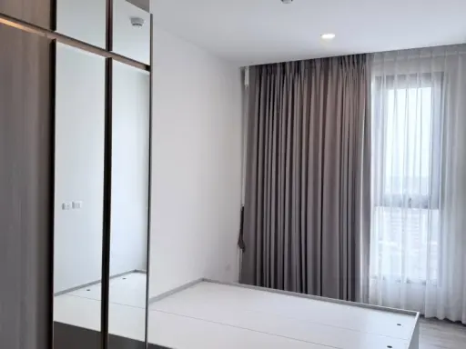 Selling Knightsbridge Collage Sukhumvit 107, a high-floor condo with unobstructed views, offering a peaceful and private atmosphere, perfect for true