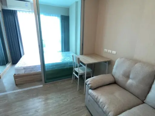 For rent: Happy Condo Don Mueang The Terminal. Room decorated in pleasant wood tones. Good built-in wardrobe, urgent images