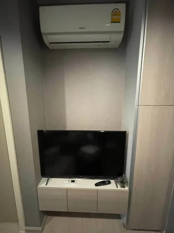 For rent: Dcon Prime Rattanathibet. A lovely unit with high-quality wallpaper and built-in furniture. Don't miss out!
