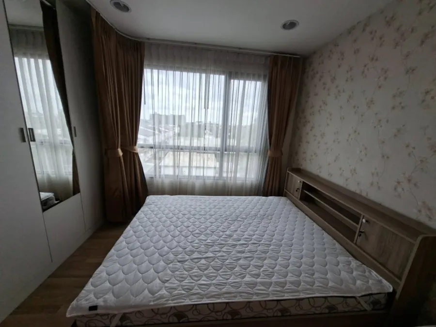 For rent: Premio Prime, Building C, 6th floor, corner room, view of houses and nearby buildings, and Kaset Nawamin Road. Reserve now!