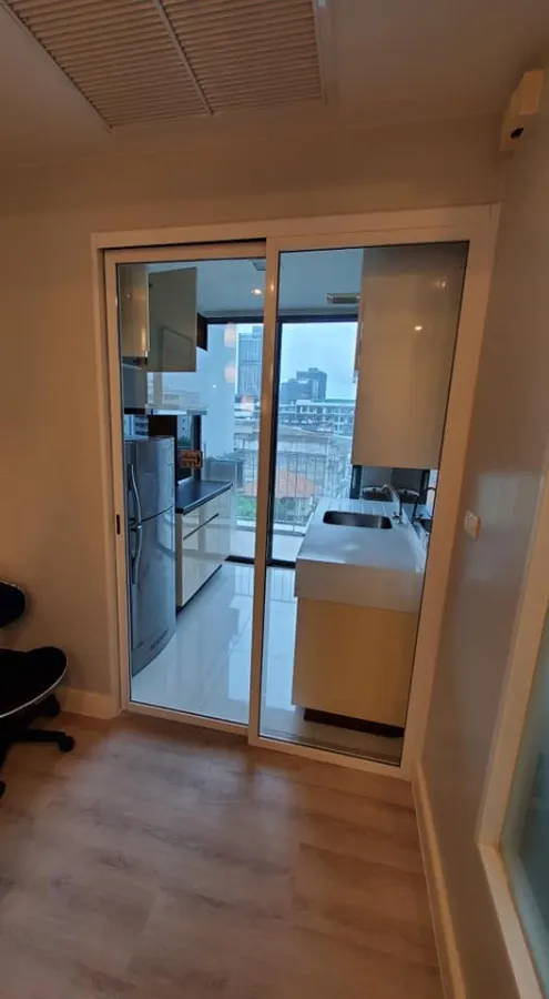 For rent: The Room Sukhumvit 62, bedrooms with awesome wallpaper. The view saw many shady trees. Let me tell you, you have to make a reservation.