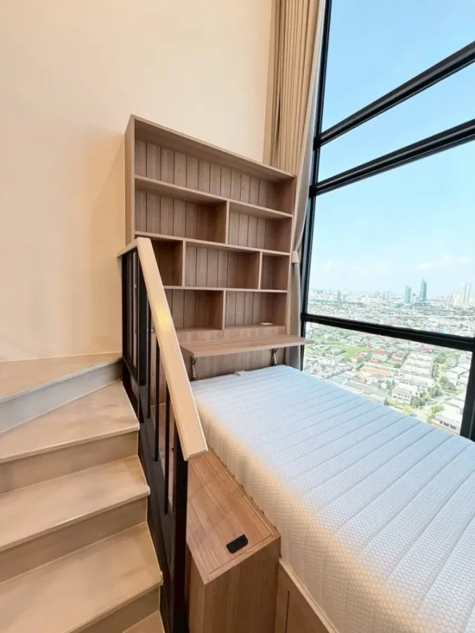 For rent: XIM Suksawat - Rama 3. Spacious room with high ceilings, airy feel, high-quality built-in furniture, and beautiful view. Book now!