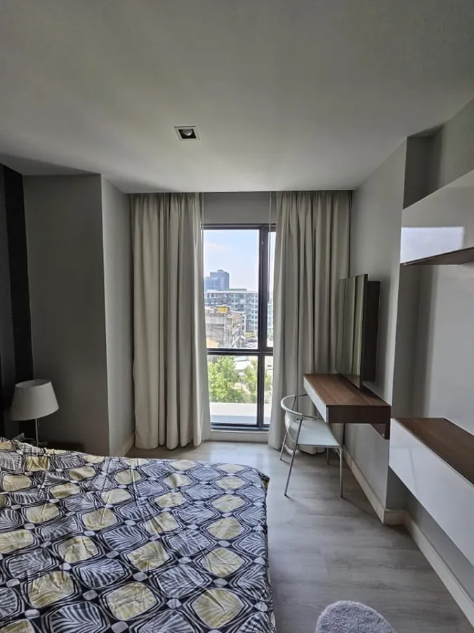 For rent: The Room Sukhumvit 62, bedrooms with awesome wallpaper. The view saw many shady trees. Let me tell you, you have to make a reservation.
