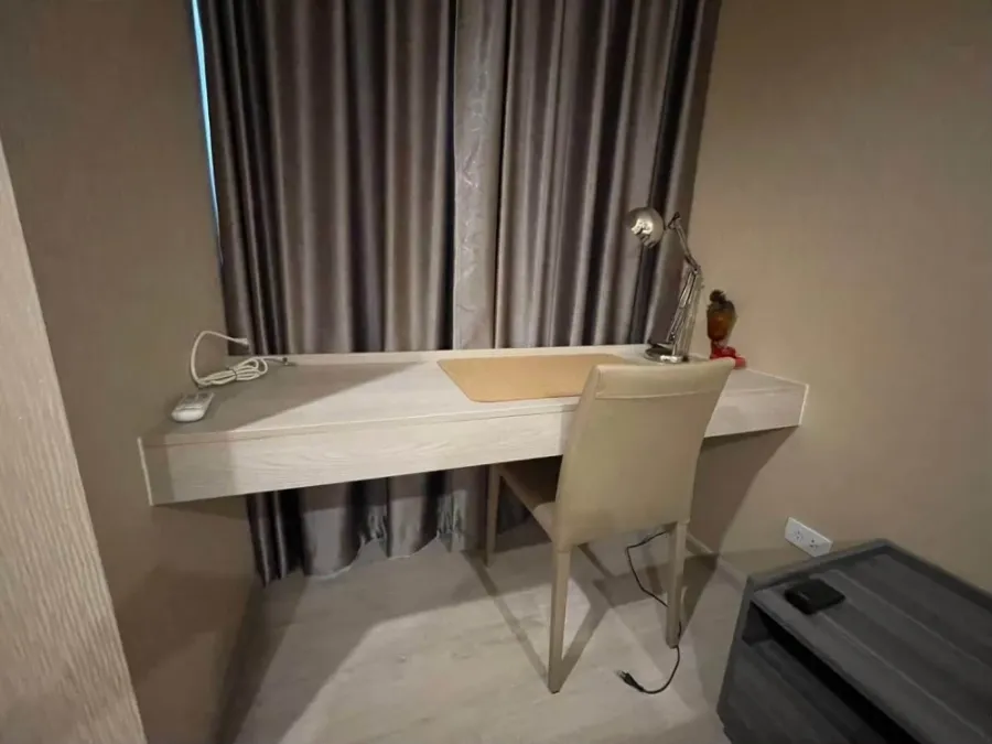 For rent: Dcon Prime Rattanathibet. A lovely unit with high-quality wallpaper and built-in furniture. Don't miss out!