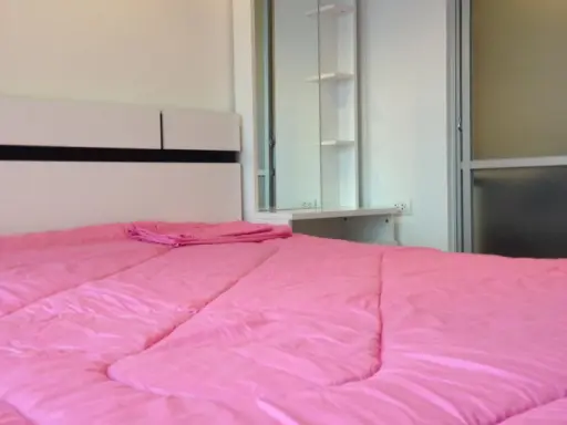 Condo for rent, Lumpini Place Ratchayothin, balcony with view of Elephant Building, BTS Skytrain in front of the condo.